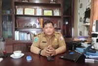 Plt Kepala Dinas Perkebunan Fakfak Widhi Asmoro Jati, ST. MT saat di temui wartawan sulsel.tagarutama.com di ruang kerjanya (Dok. sulsel.tagarutama.com)